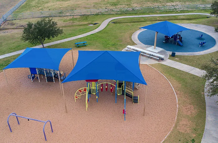 Aerial view of playground mulch under multiple play areas