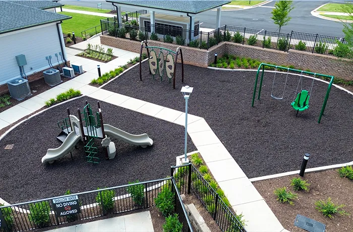 Playground mulch surfacing in clubhouse playground, completed installation by Pro Playgrounds
