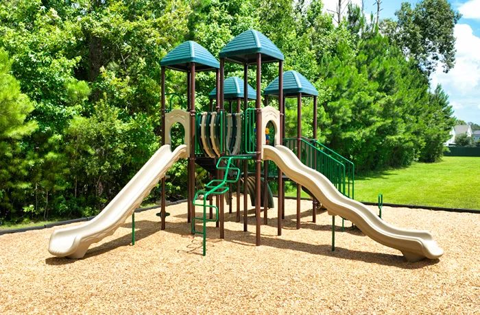 Playground mulch under playground equipment, completed installation by Pro Playgrounds