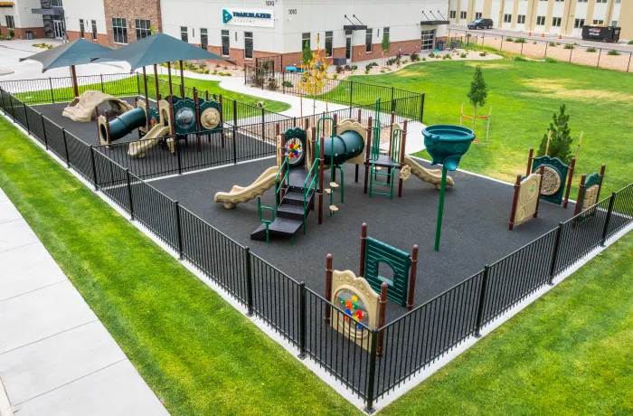 Poured-in-place rubber playground surface, installed by Pro Playgrounds