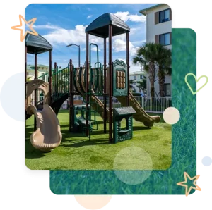 Apartment playground with synthetic turf and play structure, completed playground surfacing installation by Pro Playgrounds