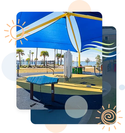 Completed shade structure installation by Pro Playgrounds with blue and yellow sail shade over playground