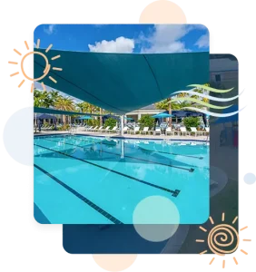 Completed shade structure installation by Pro Playgrounds featuring teal sail shade over swimming pool