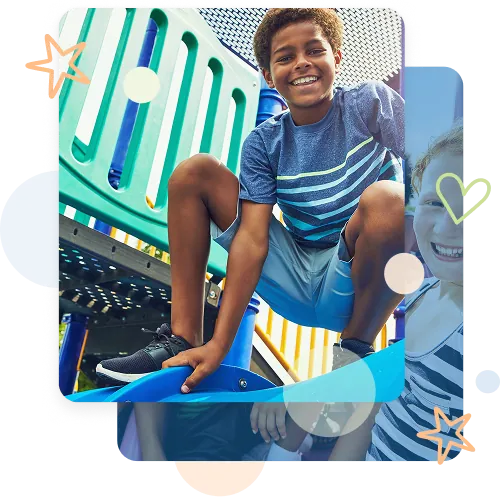 Boy using outdoor playground equipment.